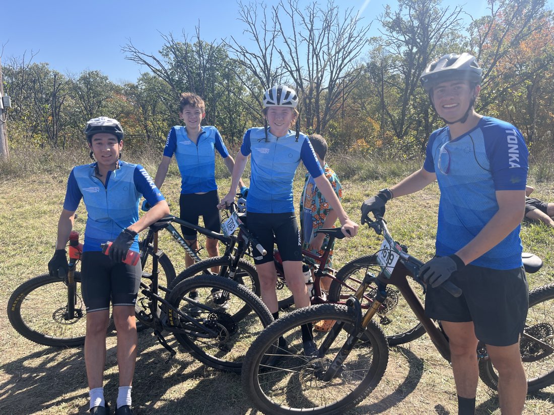 Tonka riders together with their bikes at a race